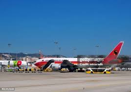 commercial airplane in flight, side view, blue sky, professional aviation photo