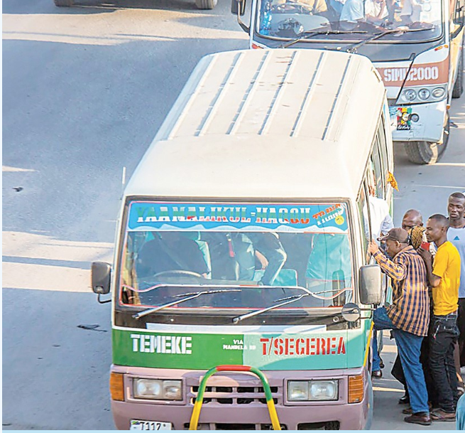 modern minibus daladala on city street, side view, clean professional photo